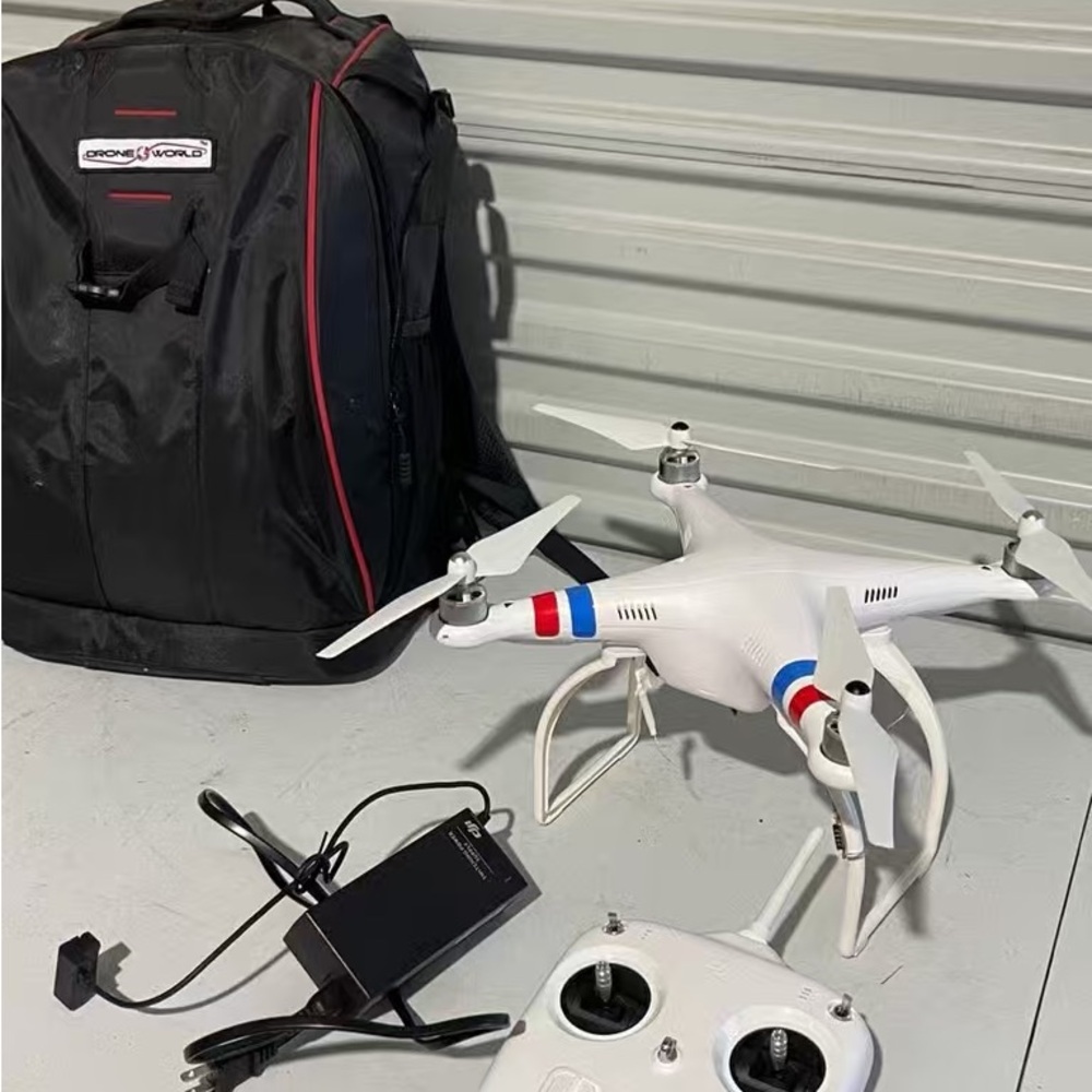 ONE WORLD White and Red Drone with Remote